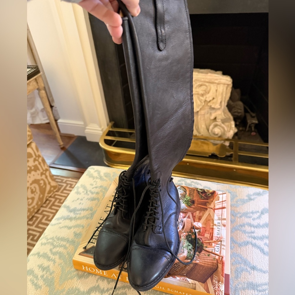Black leather riding boots. Never worn! Beautiful leather. And great quality.